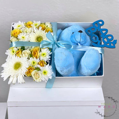 Gift set with flowers and a blue teddy bear in a box, featuring a 'Baby Boy' sign.