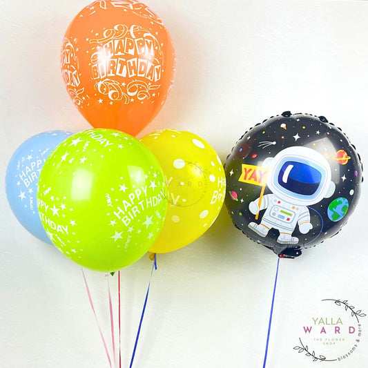 Colorful balloons with 'Happy Birthday' text and an astronaut design on a white background.