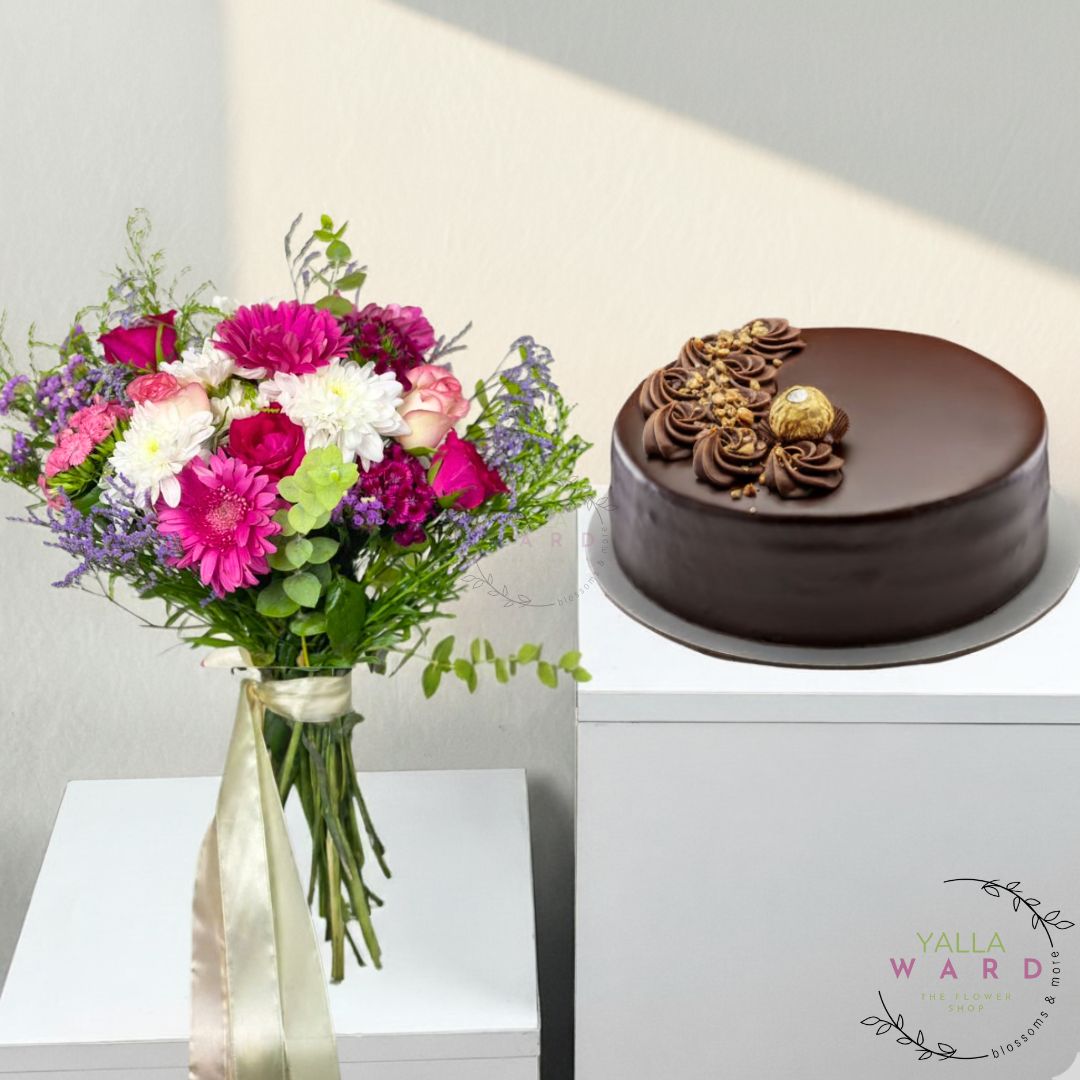 Bouquet of flowers and chocolate cake on a white surface with 'Yalla Ward' branding.